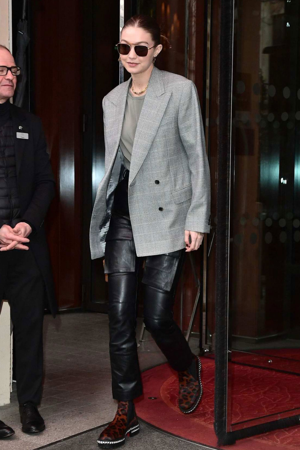 Gigi Hadid leaves Royal Monceau hotel - Leather Celebrities