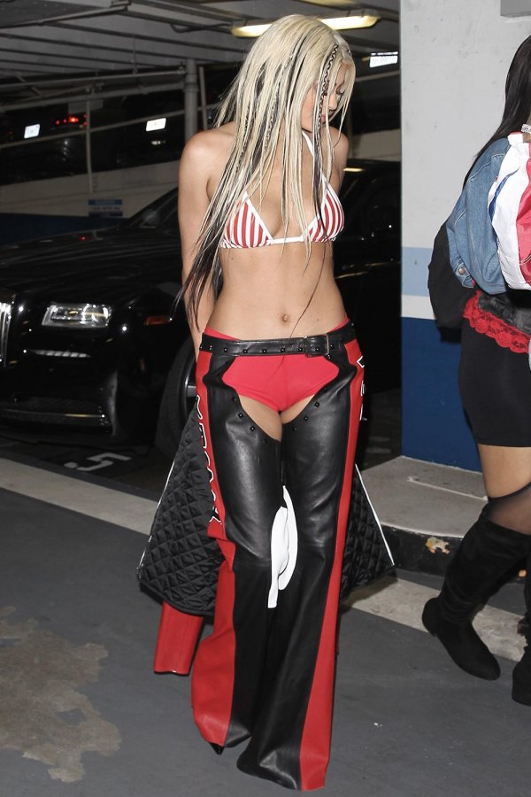 Kylie Jenner dressed as Dirty X-tina attends Bootsy Bellows Halloween party