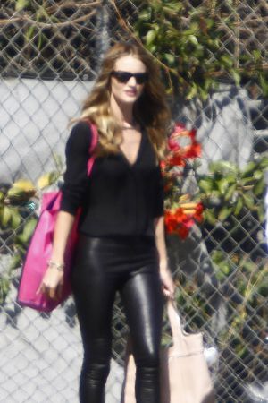 Rosie Huntington-Whiteley makes her way for an interview on the Chelse