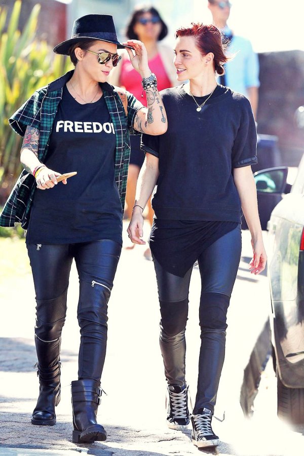 Ruby Rose and her fiancee Phoebe Dahl hold hands