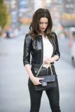 Melissa Bolona in New York City wearing Loro Piana jacket and Alaia purse