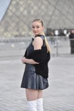 Sophie Turner turns heads in leather mini skirt and £1,360 Louis Vuitton  slippers