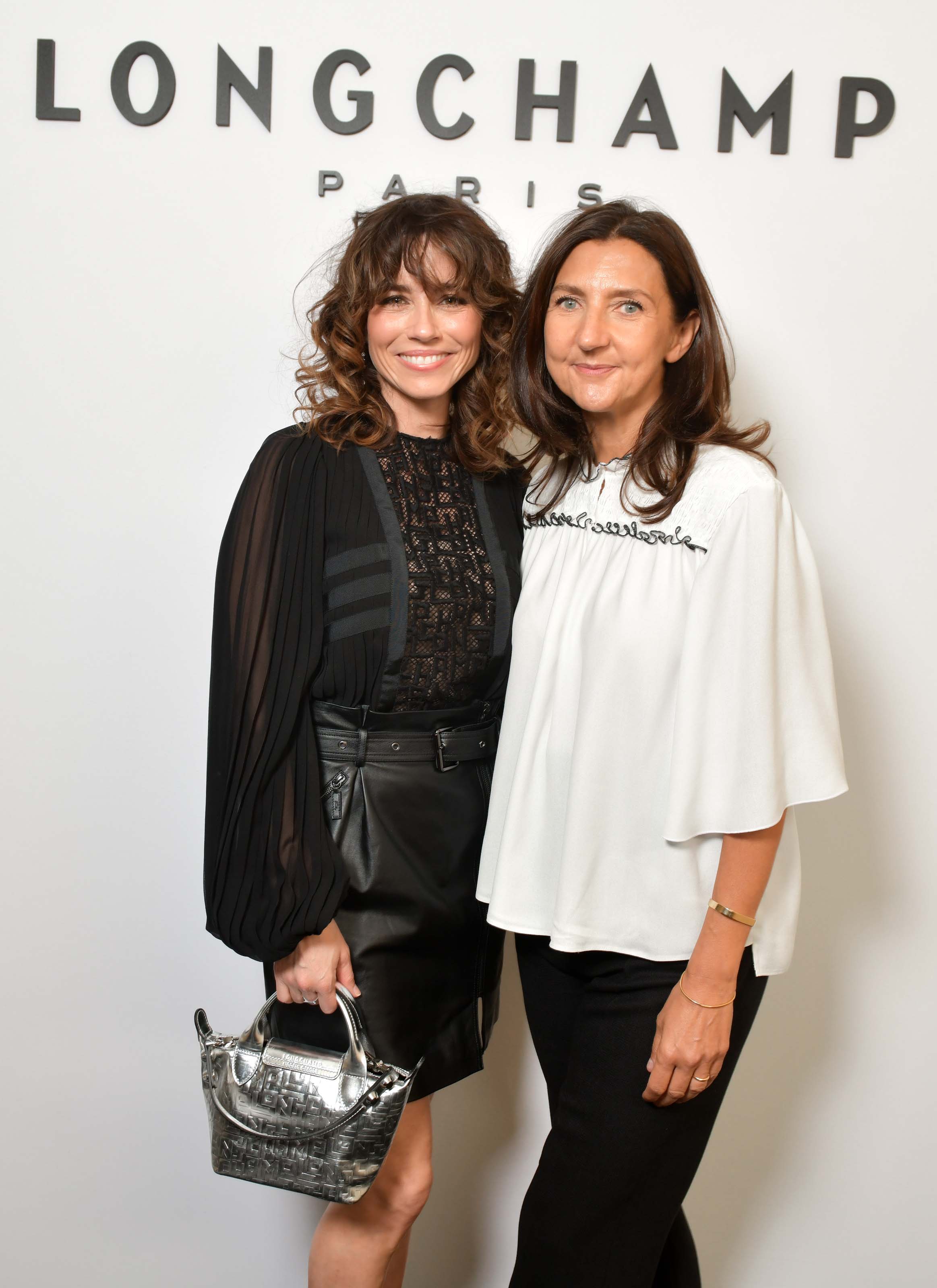 Linda Cardellini attends Longchamp show